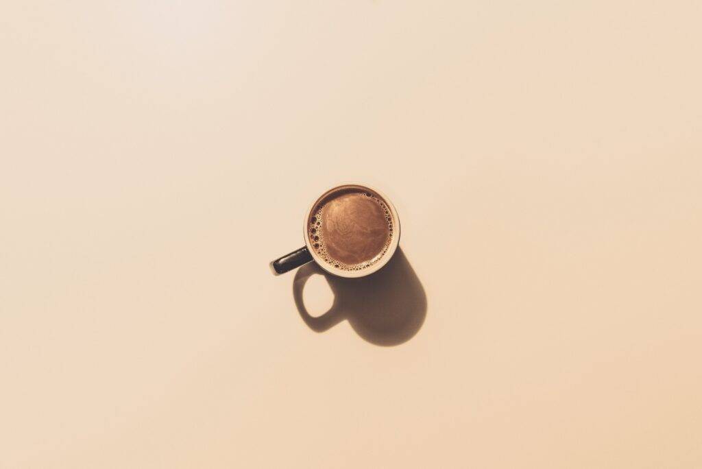 brown ceramic teacup